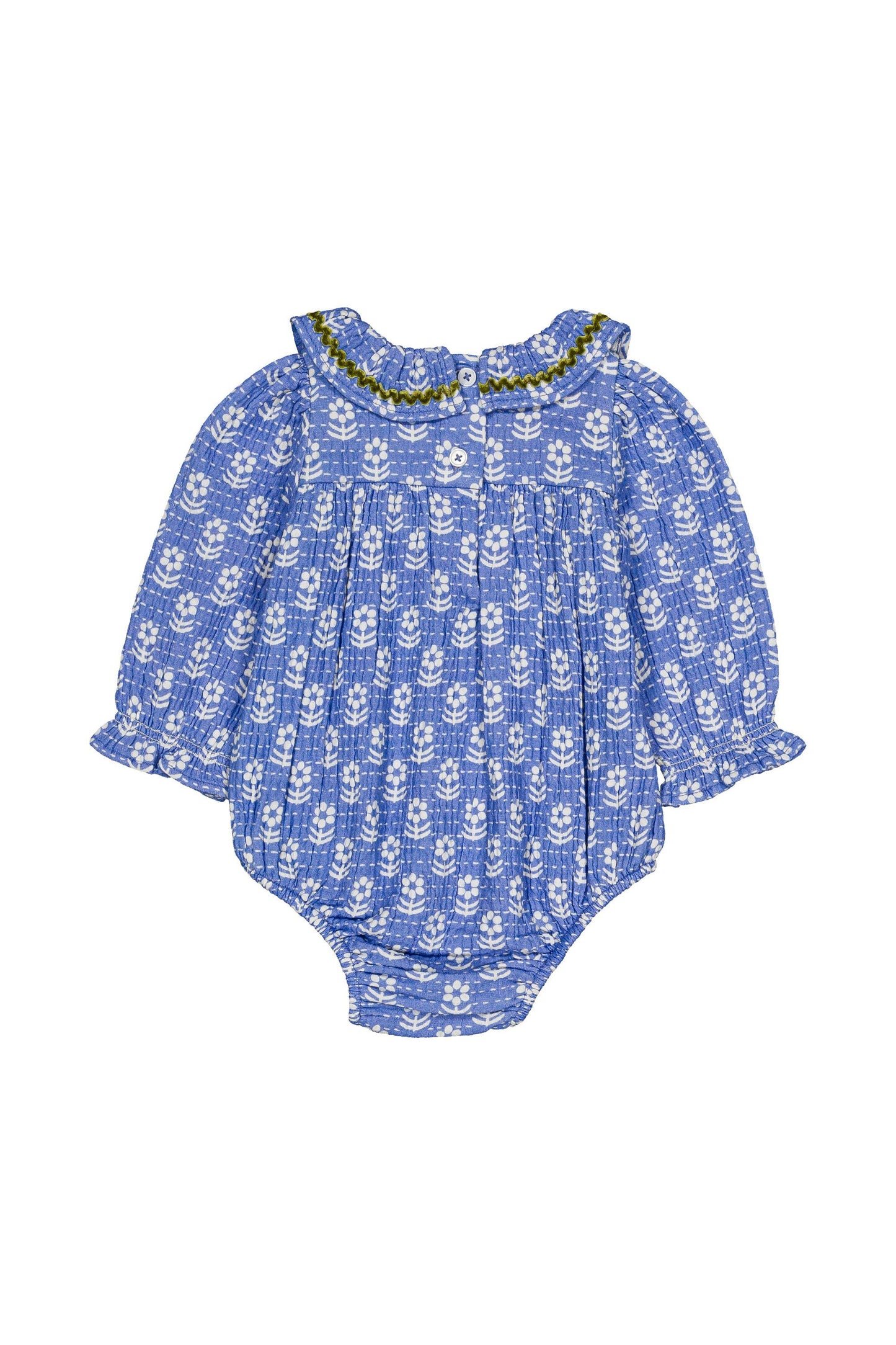 A baby romper in blue and white with a repeating floral pattern, featuring a ruffled collar with a green beaded trim, displayed on a solid white background.