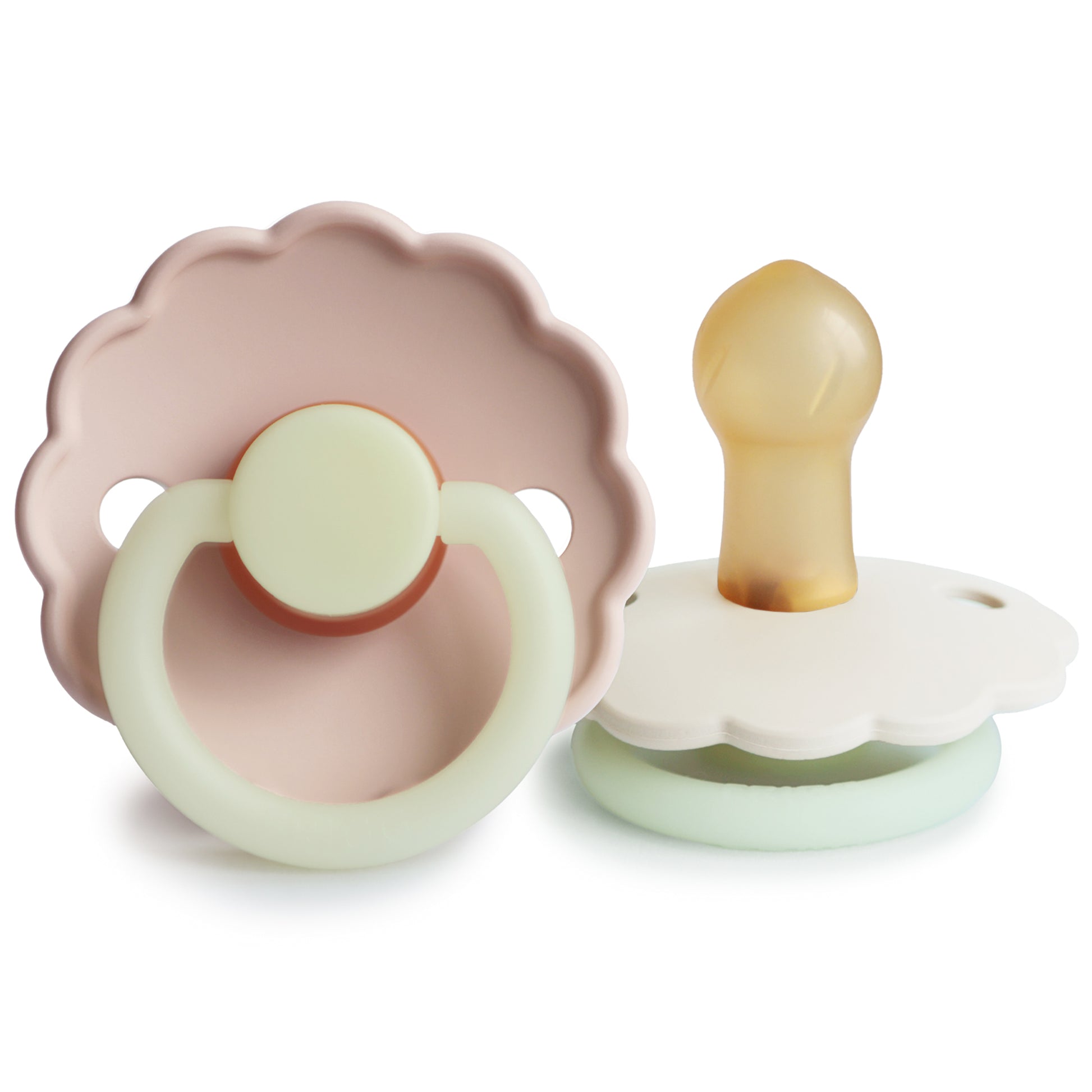 Two baby pacifiers, one pink and one beige, on a white background