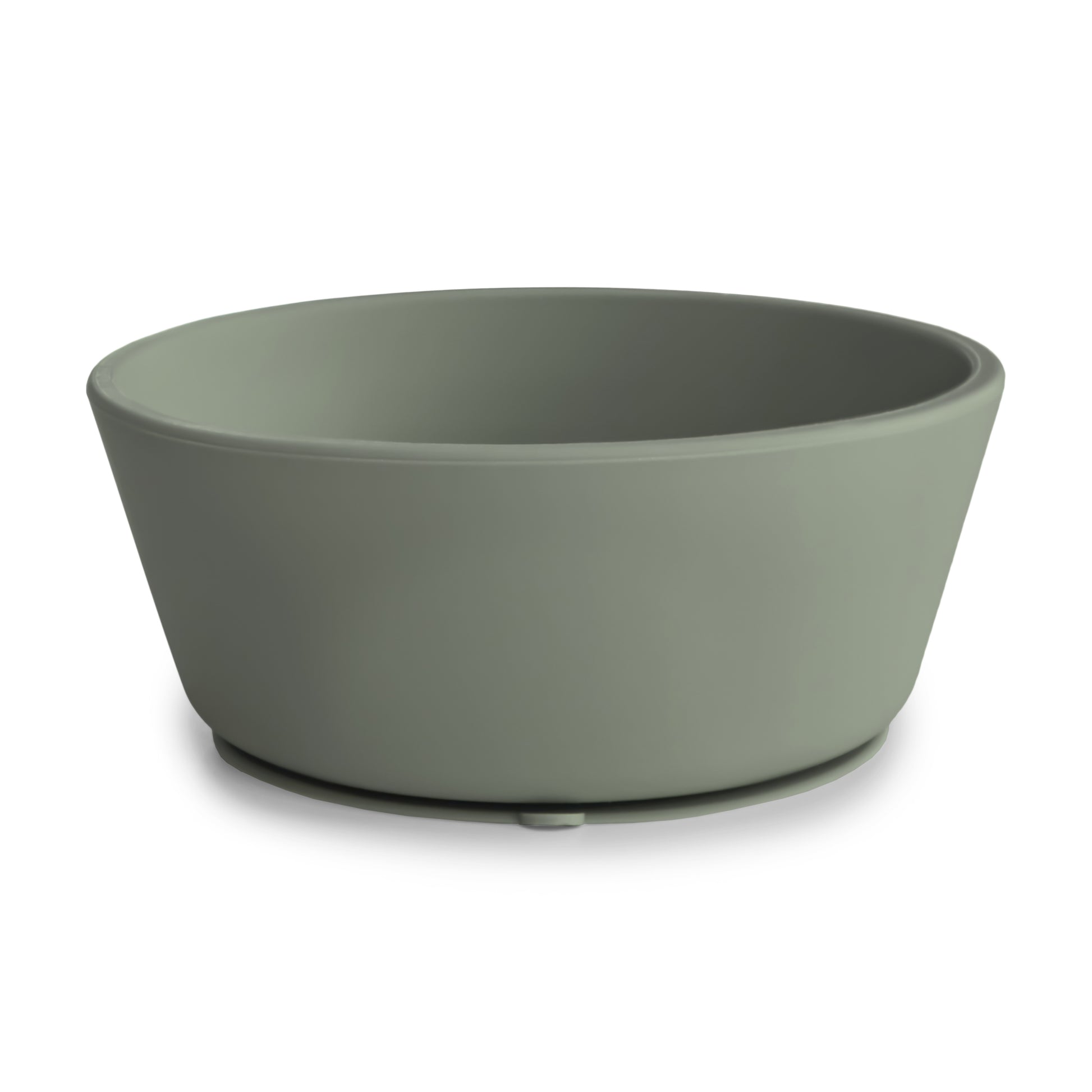 Green silicone suction bowl on a white background
