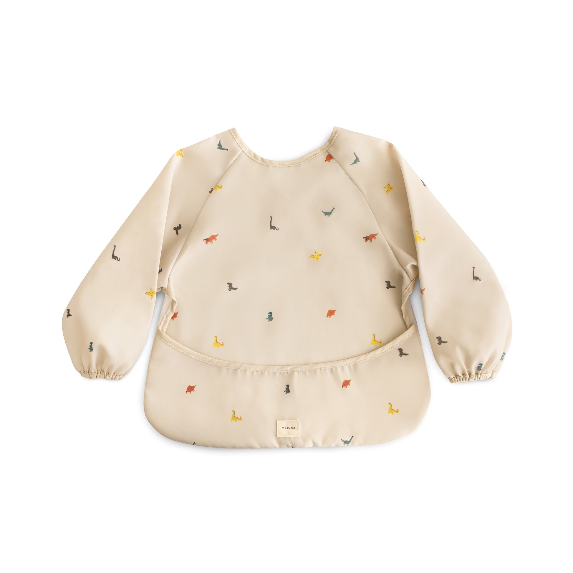 Beige baby bib with small colorful dinosaurs on a white background