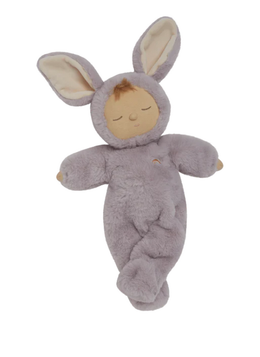 Plush toy resembling a baby in a lavender bunny suit on a white background