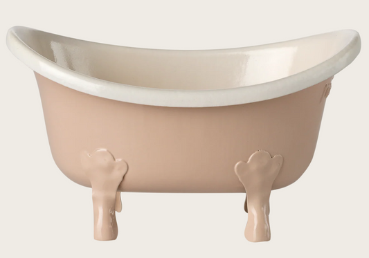Bathtub for dolls in rose color with white interior on a white background