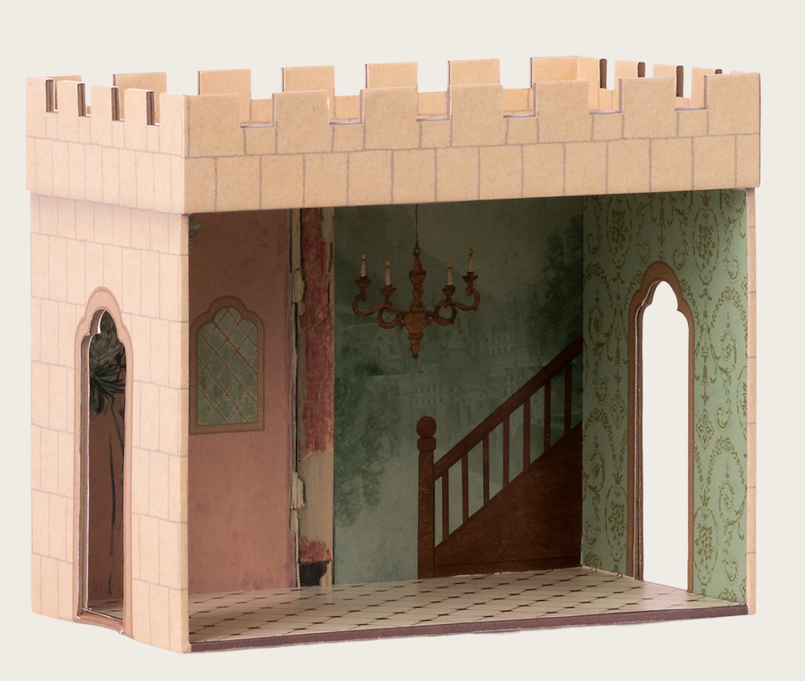 cardboard play castle on white background