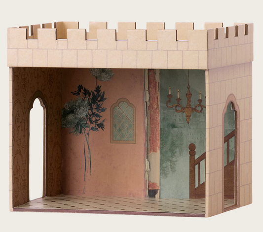 cardboard play castle on white background