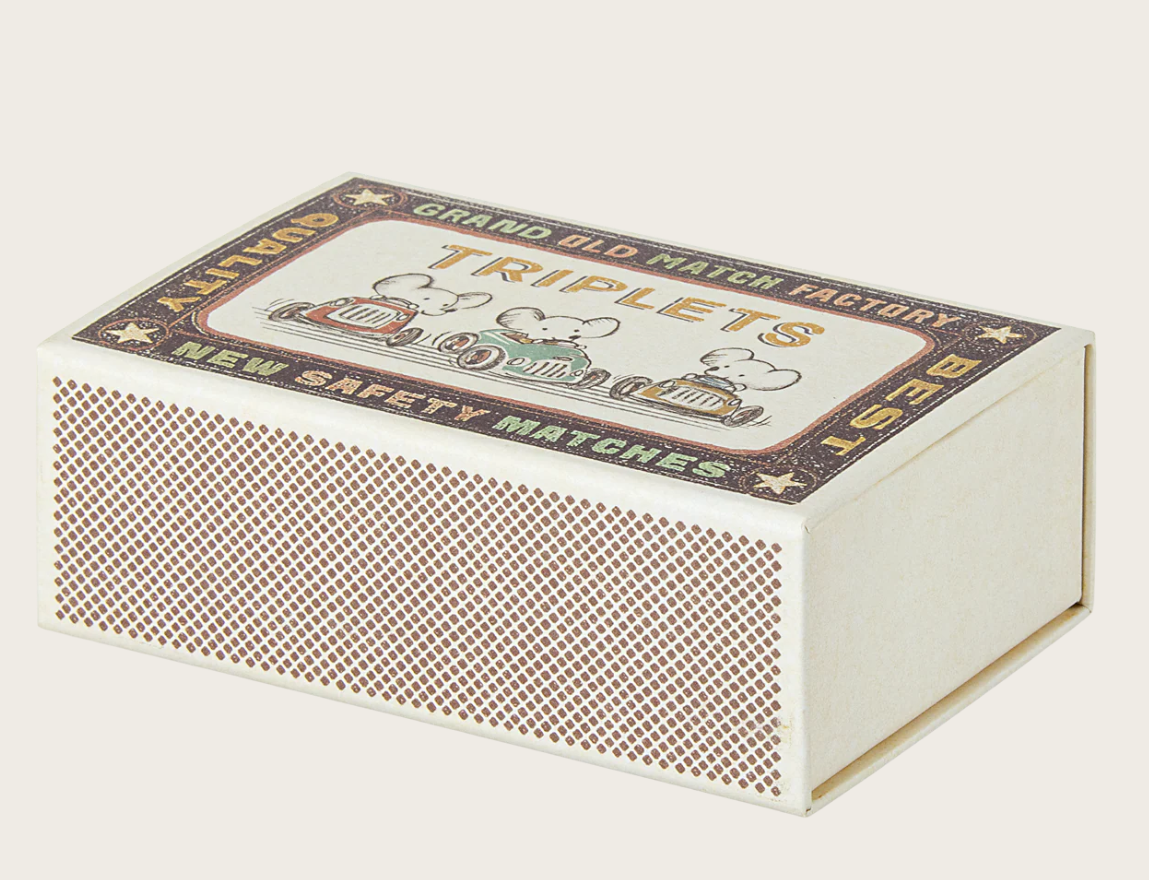 closed matchbox bed for mouse dolls on white background