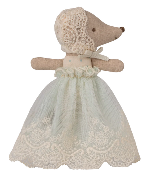 small baby mouse doll in a lace bonnet and blue lace dress on a white background