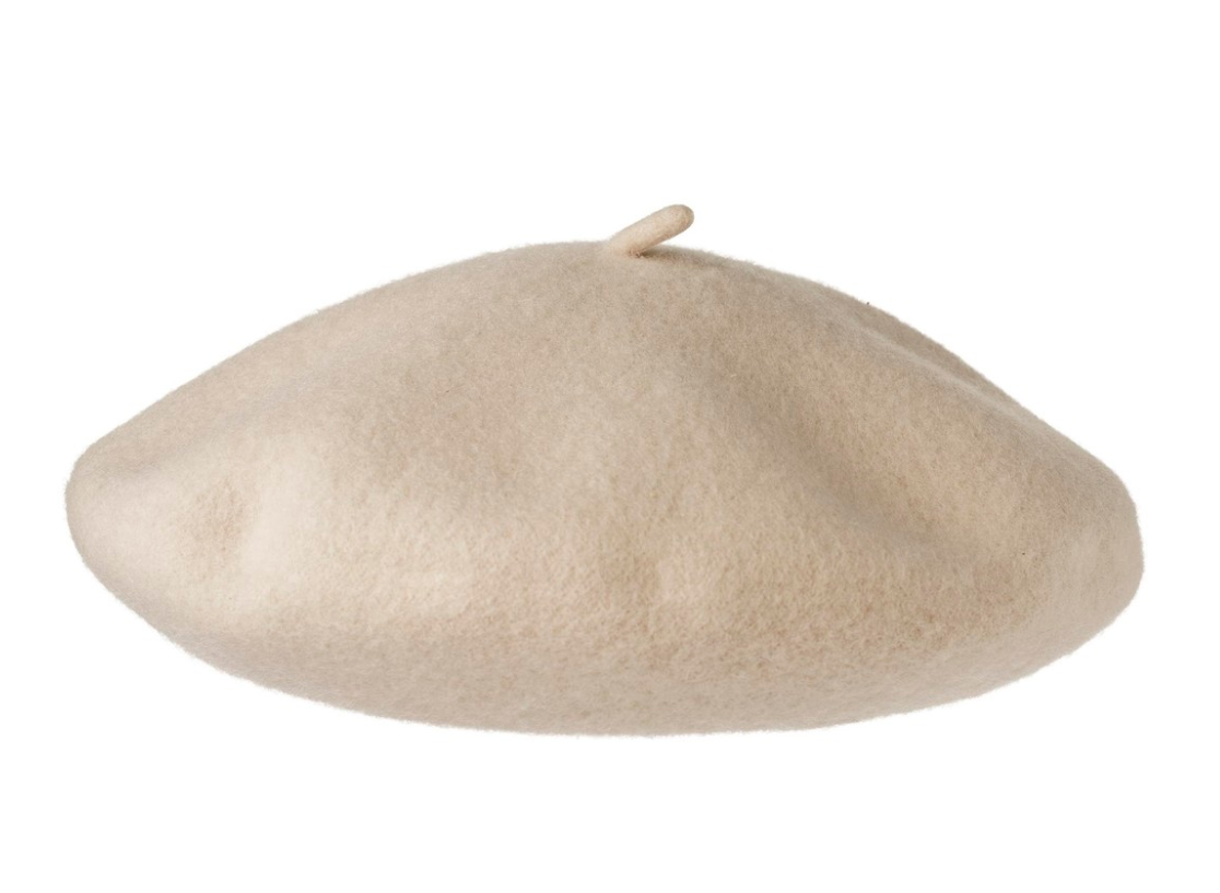 ivory wool child's beret on a white background