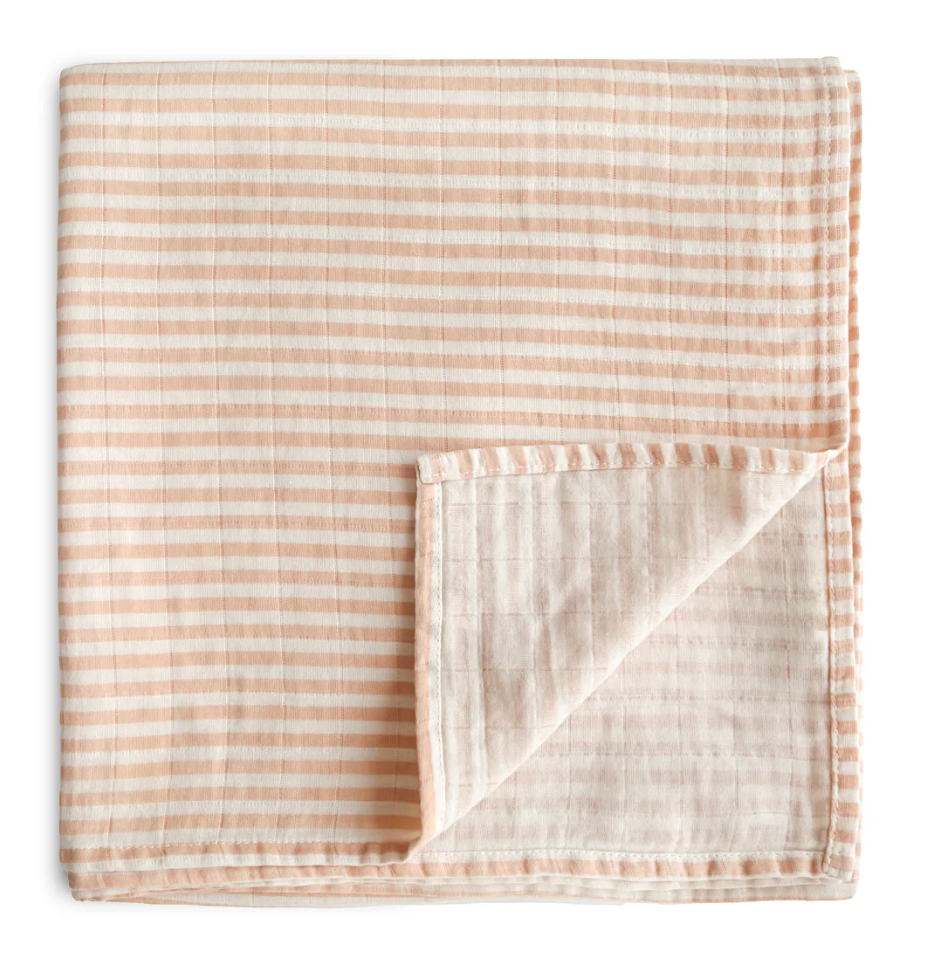 Beige and white striped fabric on a white background