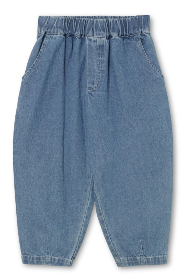 Front view of denim pants with elasticized waist, tapered at ankles.