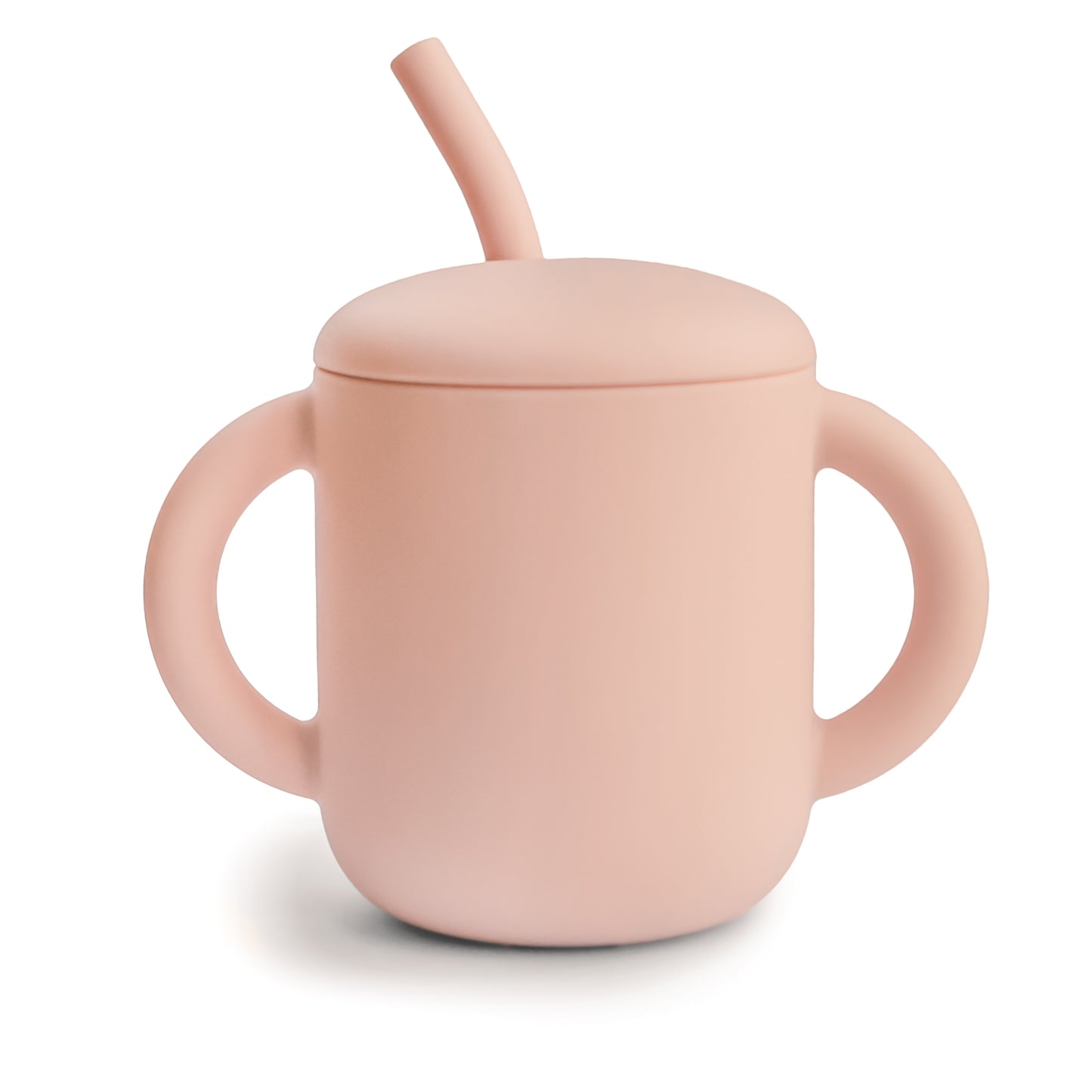 Pink sippy cup with a straw on a white background