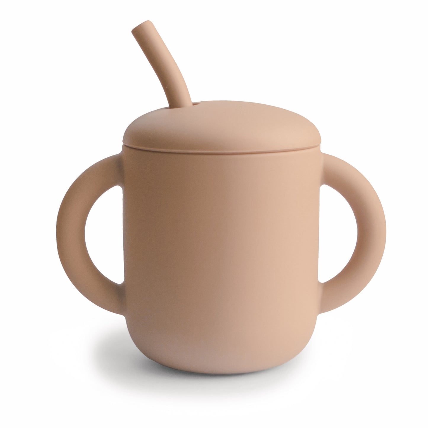 Tan sippy cup with a lid and straw on a white background