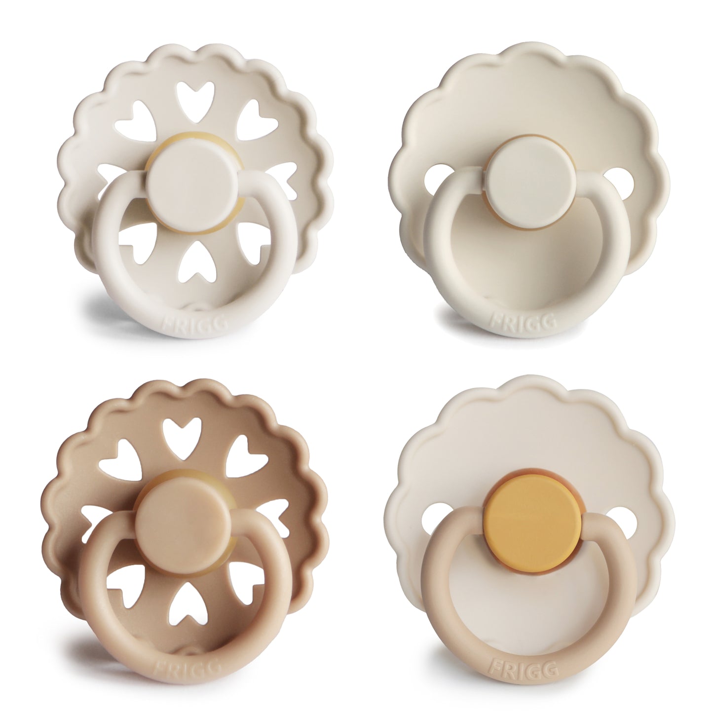 Four baby pacifiers in beige, white, and brown on a white background