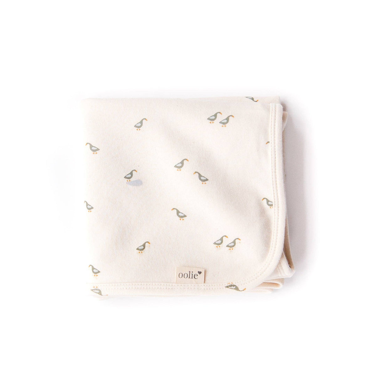 Baby blanket with duck pattern on a white background