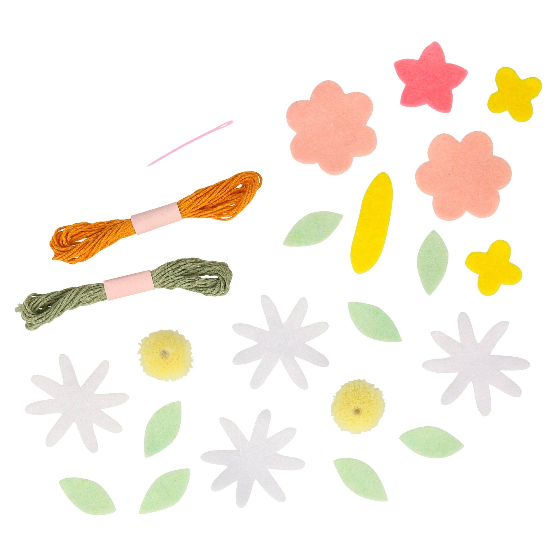 Colorful flower-shaped cutouts and ribbons on a white background
