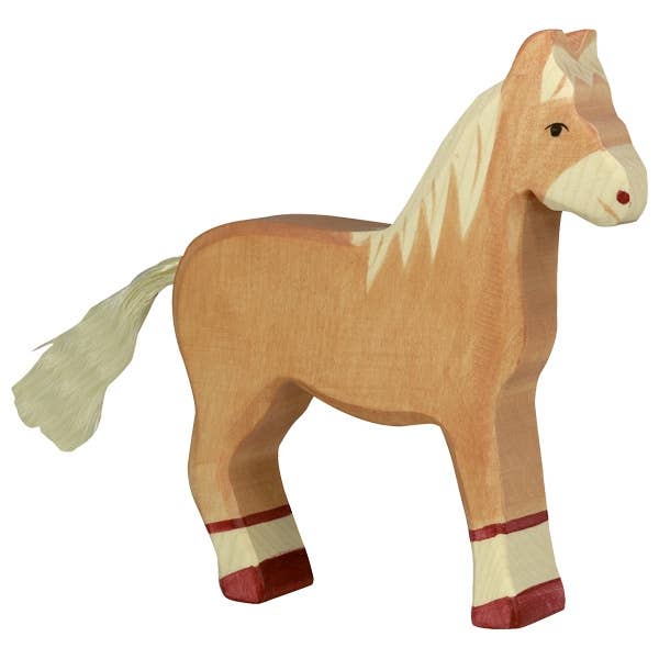A wooden toy horse with light brown color and reddish brown and white legs.