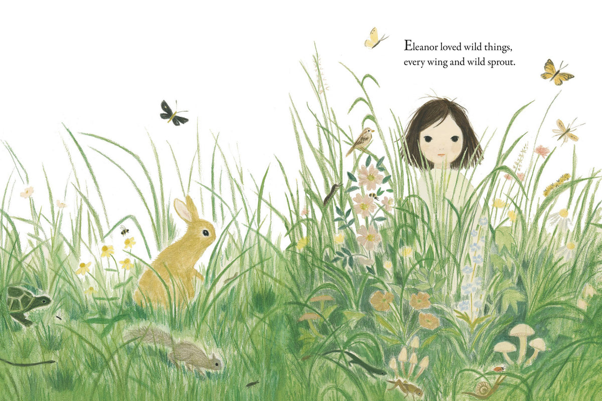 Picture book page featuring the character Eleanor in some grass with a rabbit