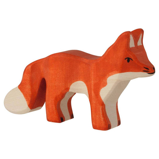 Wooden fox figure on a white background