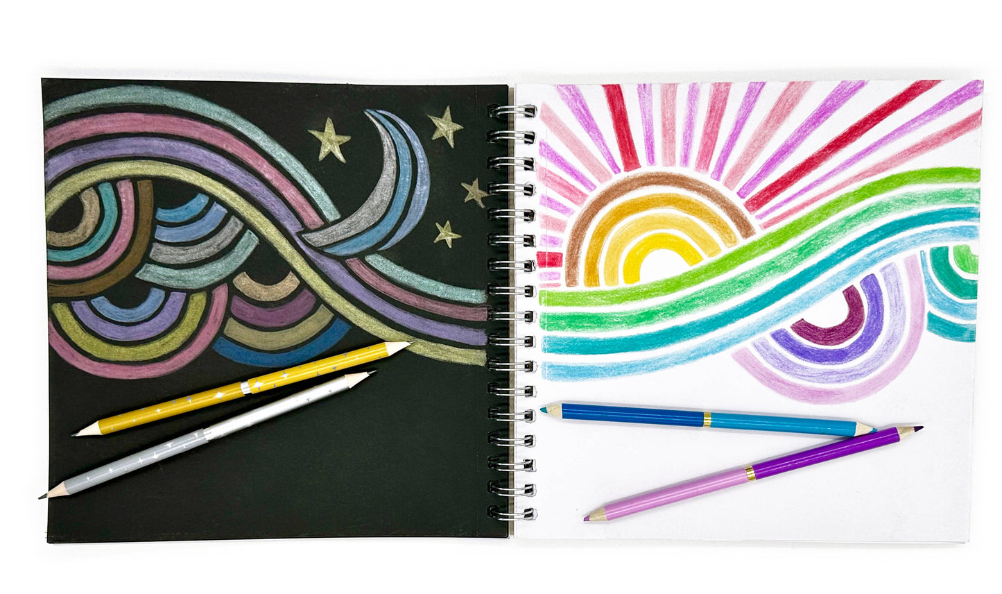 Two spiral-bound sketchbooks with colorful designs and pencils on a white background