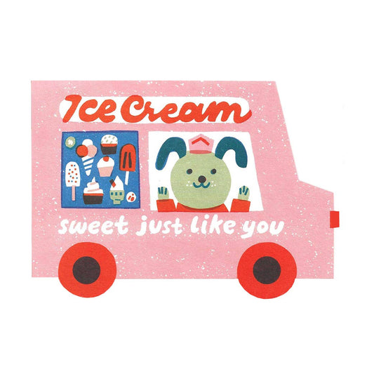 Card with illustration of an ice cream truck with a cartoon dog and text 'Ice Cream sweet just like you' on a pink background.