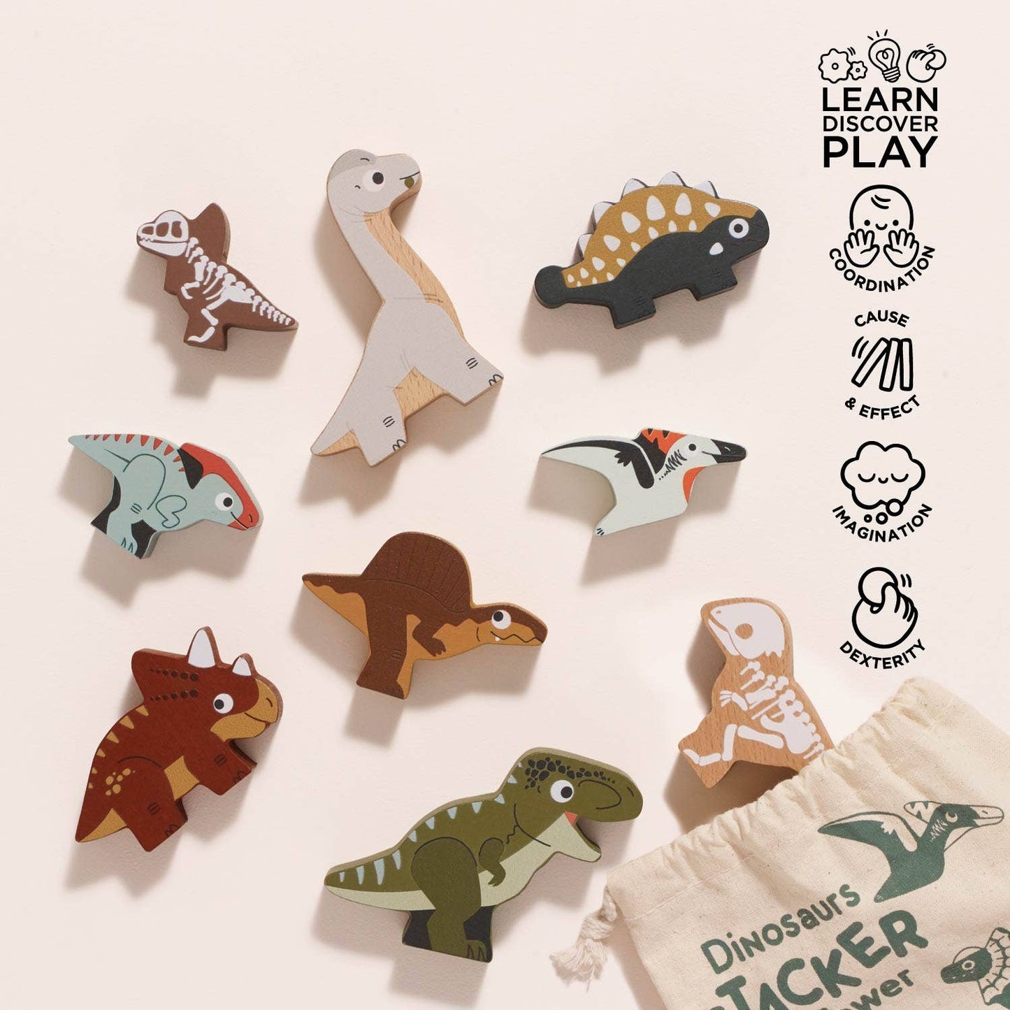 Set of wooden dinosaur toys with a drawstring bag on a light background