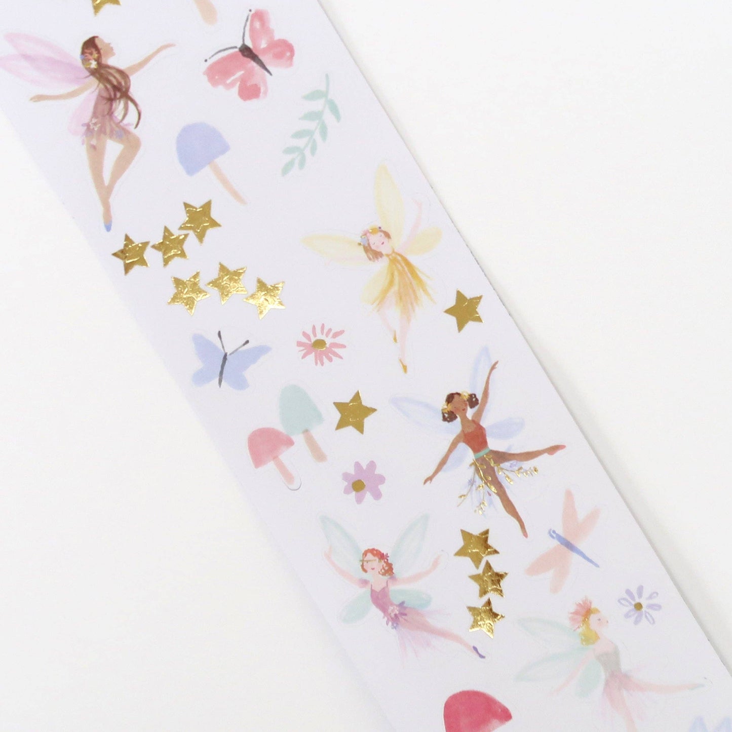 Sheet of fairy and star stickers on a white background