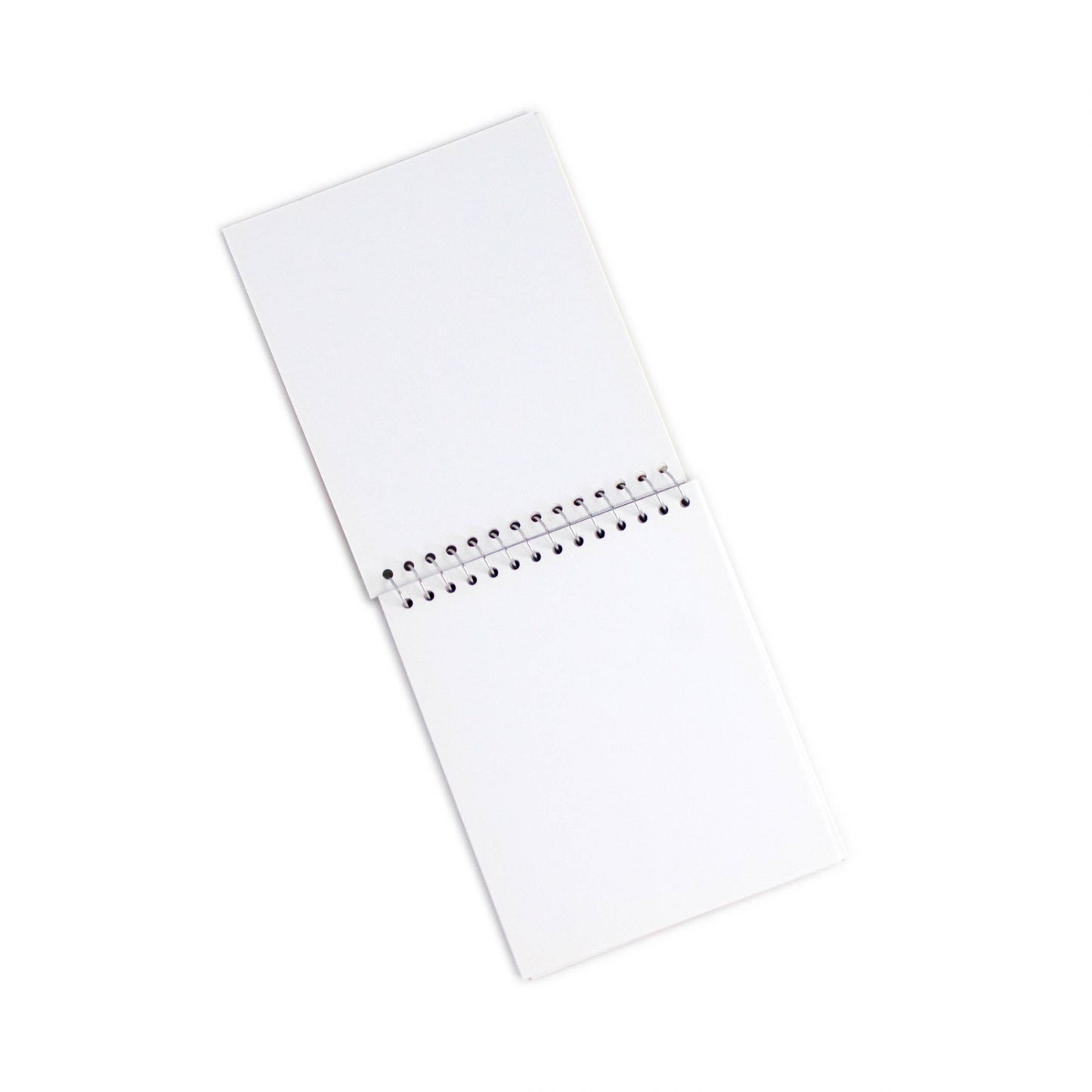 White notebook with blank pages on a white background