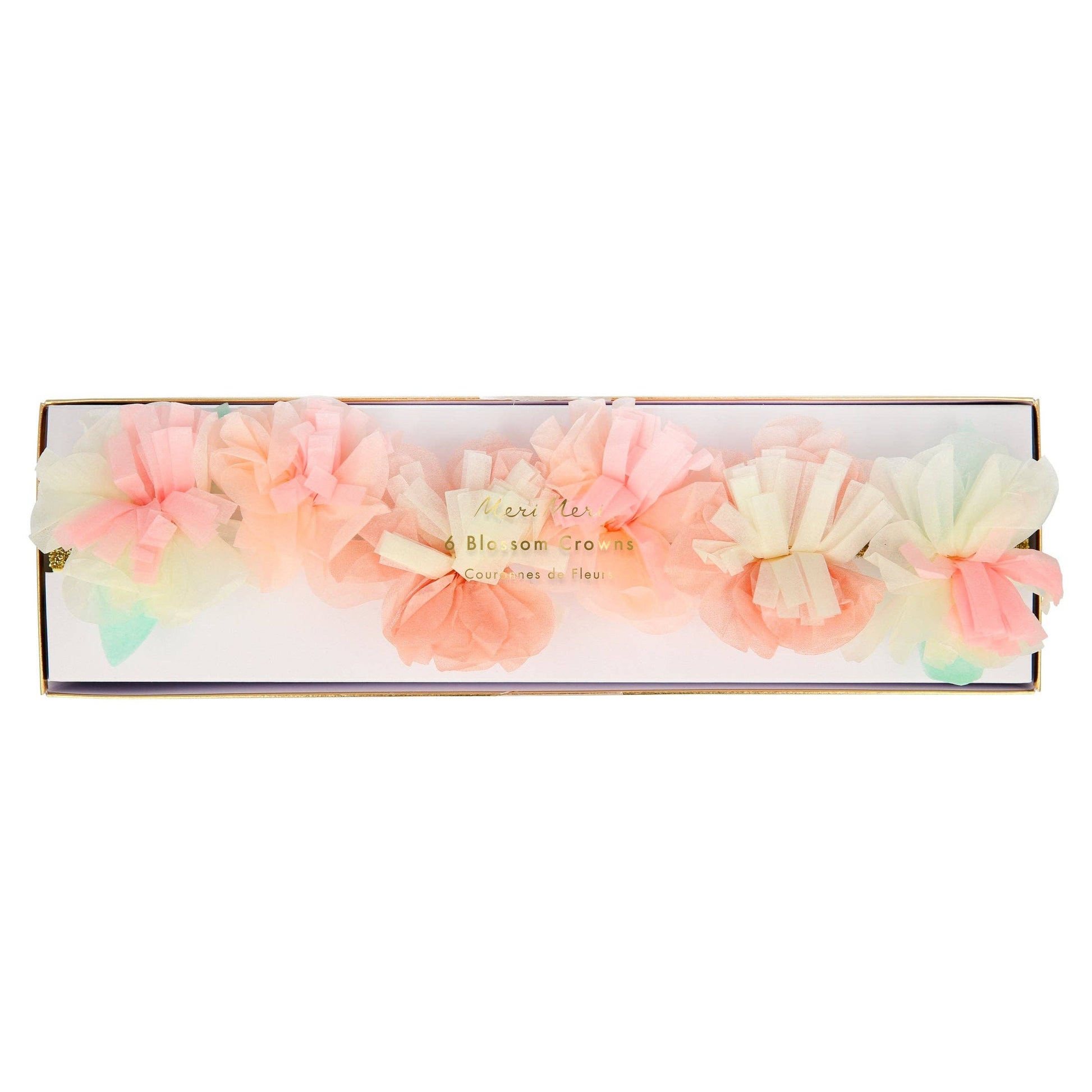 Set of colorful hair scrunchies in a box on a white background
