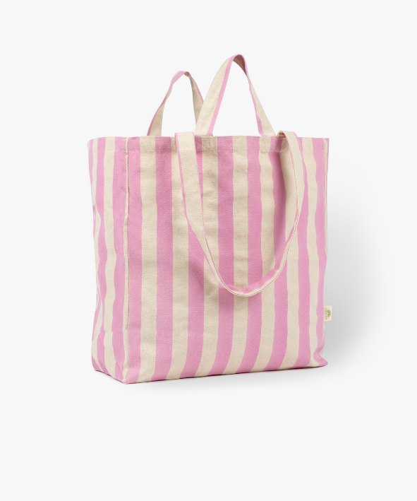 Pink and white striped tote bag on a white background