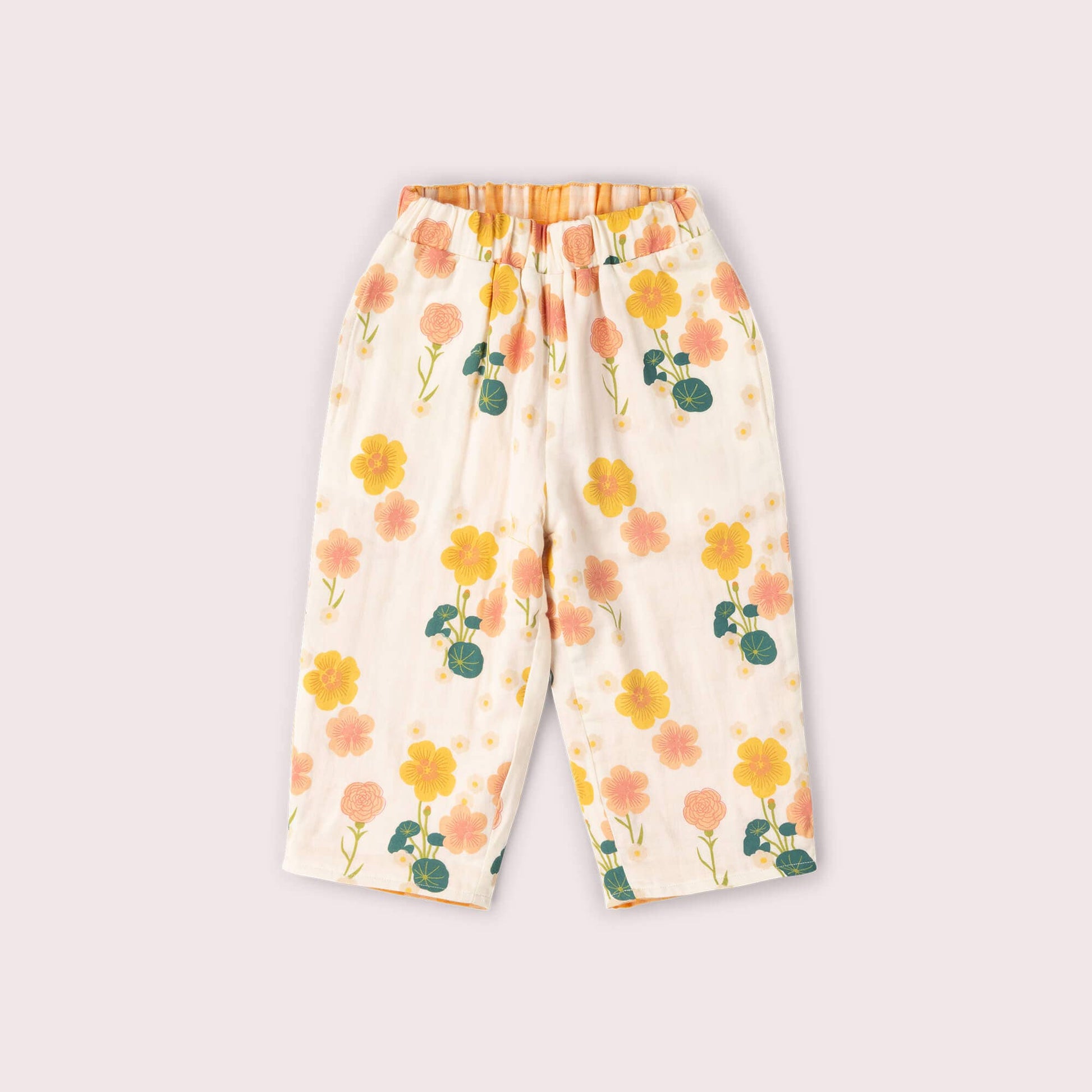 Floral-patterned pants on a light gray background