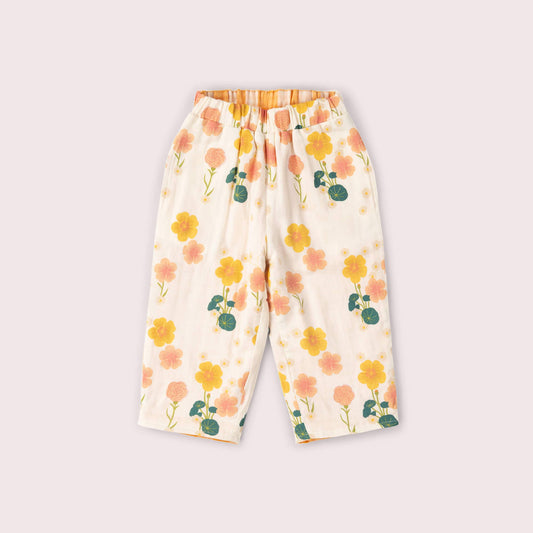 Floral-patterned pants on a light gray background