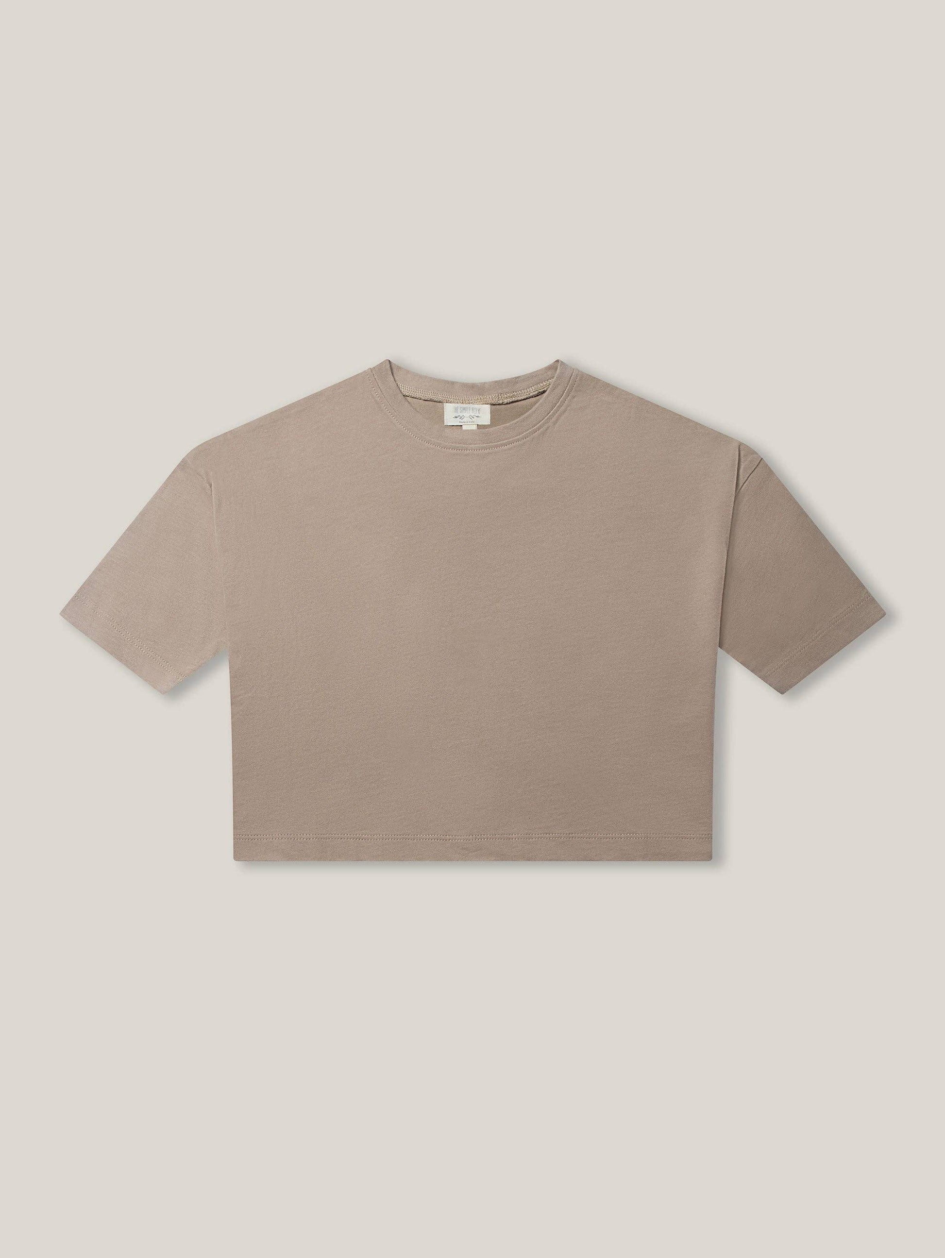 Beige t-shirt on a light beige background