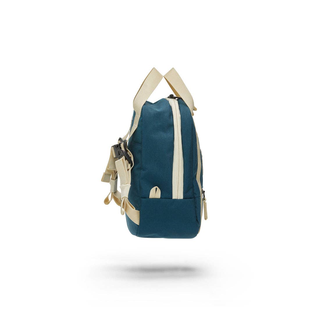 side view of navy walker goods kids backpack
