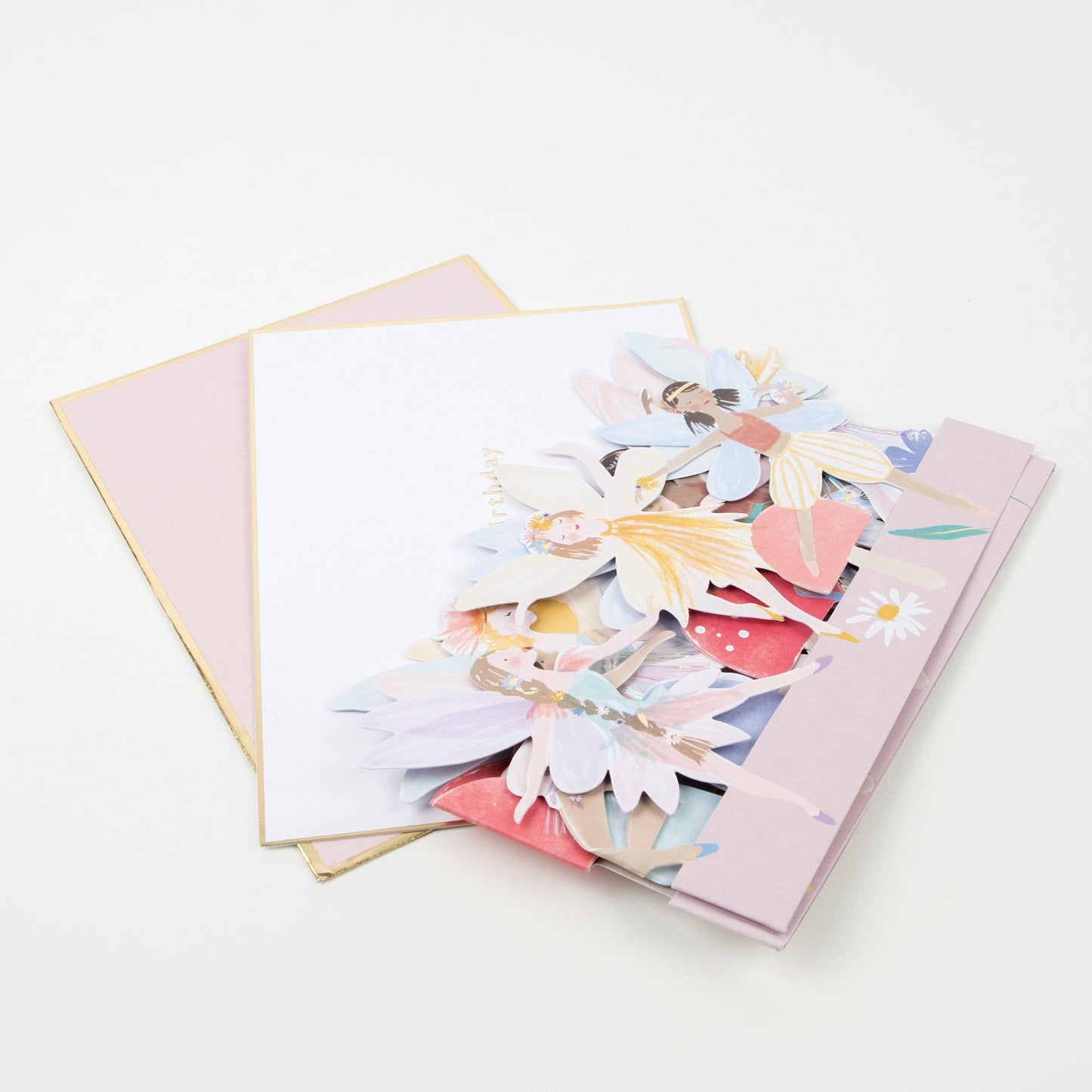 Set of greeting cards with colorful fairy designs on a white background
