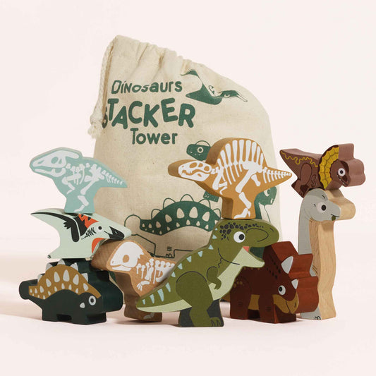 Set of wooden dinosaur toys with a 'Dinosaurs Stacker Tower' bag on a light background