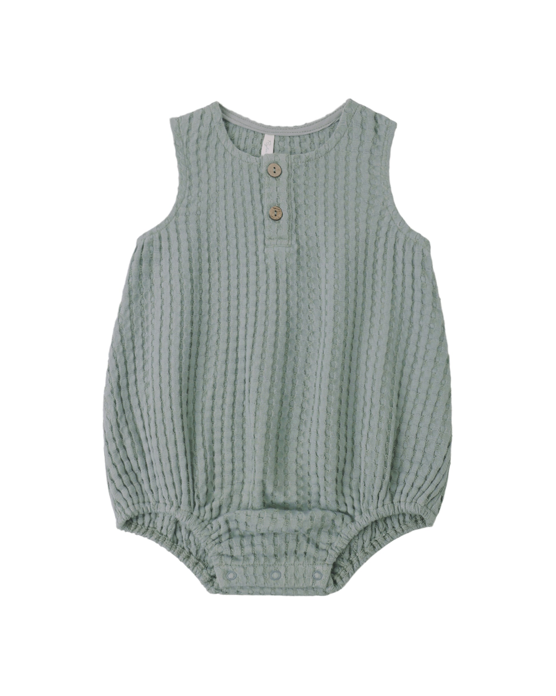 Green baby romper with button details on a white background