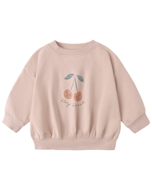 Pink sweatshirt with cherry design on a white background