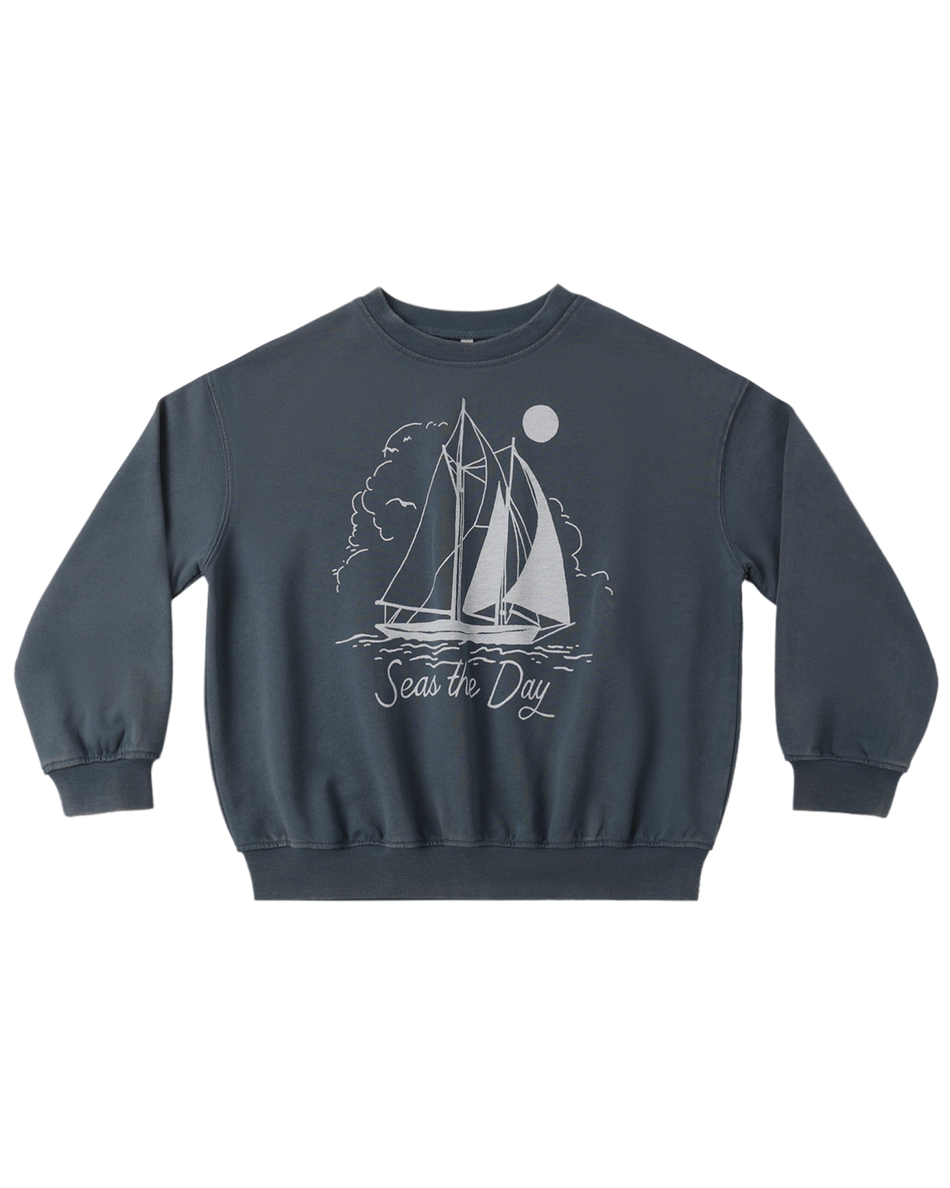 Navy blue sweatshirt with sailboat graphic and 'Seas the Day' text on a white background