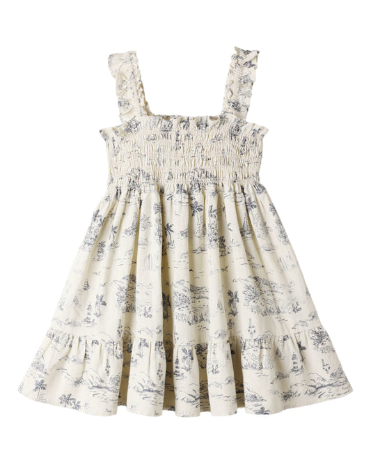 Floral dress with smocked bodice and ocean toile pattern on a white background