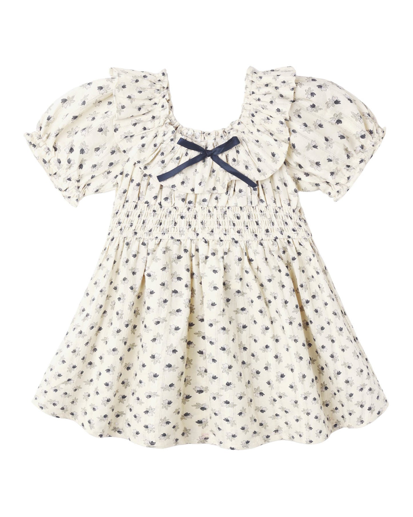 Ivory child's dress with ruffle collar, blue ribbon on collar and ruching at waist with an allover blue floral print