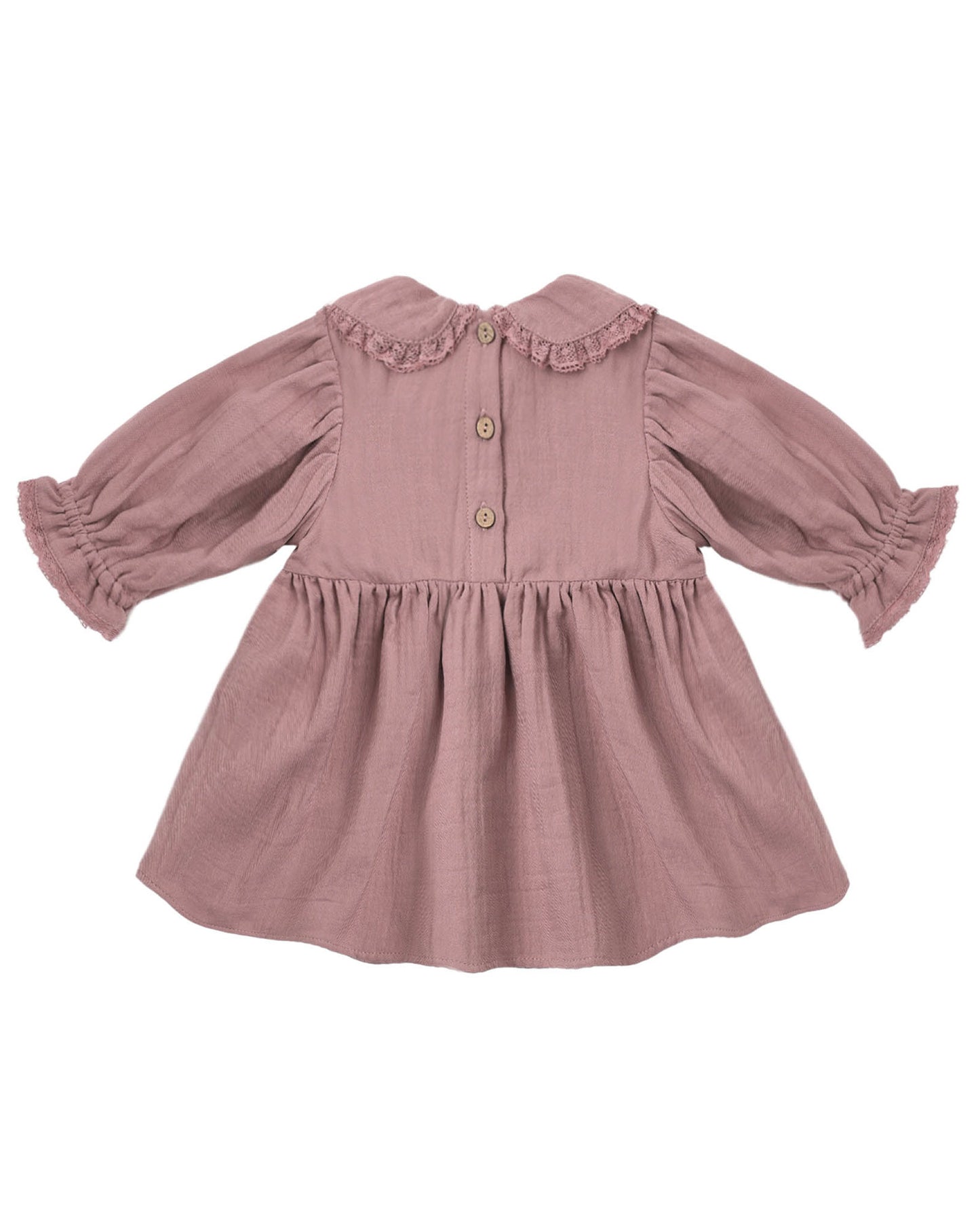 Pink dress with ruffled sleeves and neckline on a white background