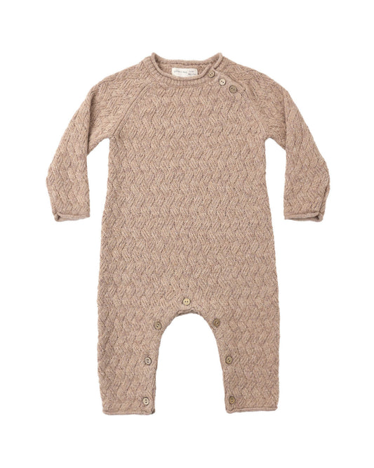 Knit baby jumpsuit in almond color on a white background