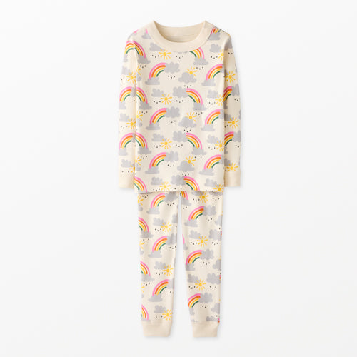 Children's pajama set with cloud and rainbow pattern on a white background