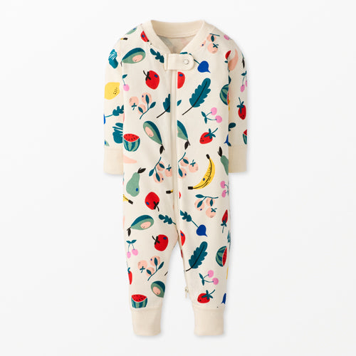 Baby zippered onesie with colorful fruit and vegetable pattern on a white background